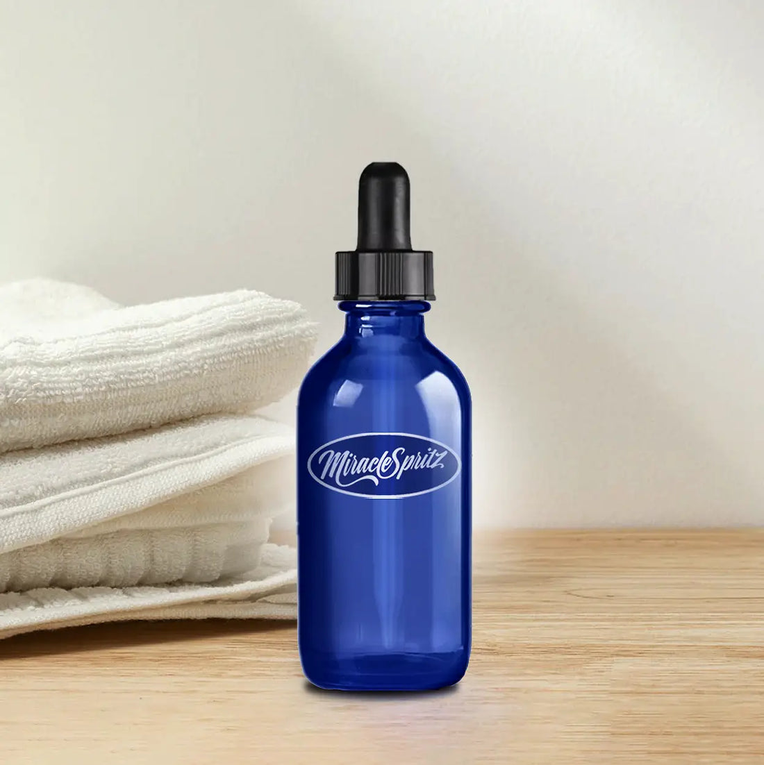 2oz dropper bottle of serum by Miracle Spritz